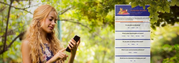 beautiful-mockup-of-blonde-girl-using-her-smartphone-below-a-tree