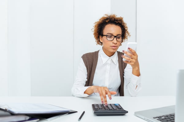 thoughtful-african-woman-accountant-working-with-c-2021-08-26-18-19-43-utc